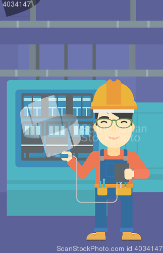 Image of Electrician with electrical equipment.