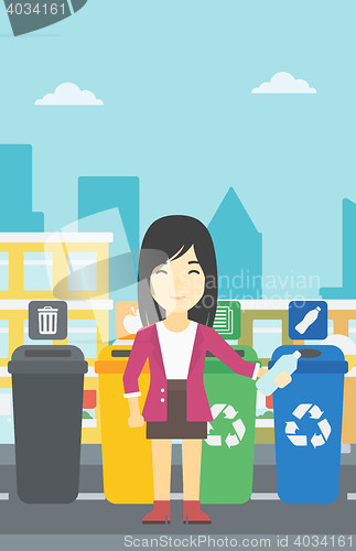 Image of Woman throwing away plastic bottle.