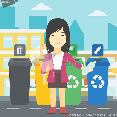 Image of Woman throwing away plastic bottle.