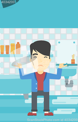 Image of Man in despair standing near leaking sink.