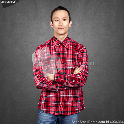 Image of Asian Man With Folded Hands