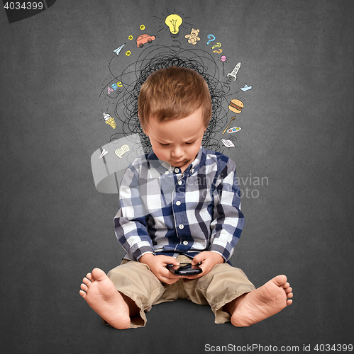 Image of Little boy thinking