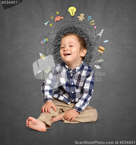 Image of Little boy thinking