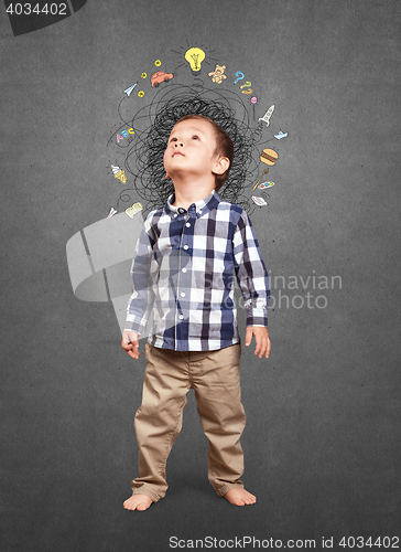 Image of Little boy thinking