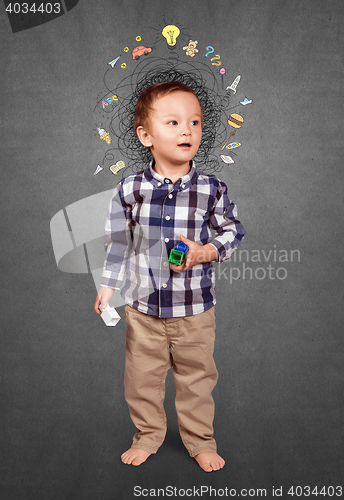 Image of Little boy thinking