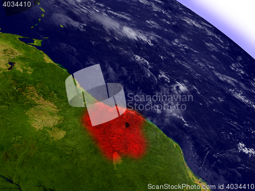 Image of Suriname from space highlighted in red