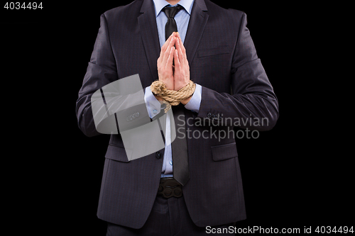 Image of Businessmen tied hand