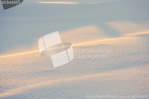 Image of landscape. weather, snowdrifts in the foreground