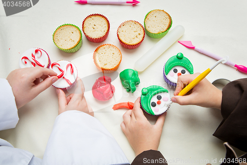 Image of Closeup of funny christmas cupcakes