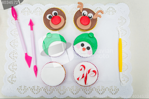 Image of Closeup of funny christmas cupcakes