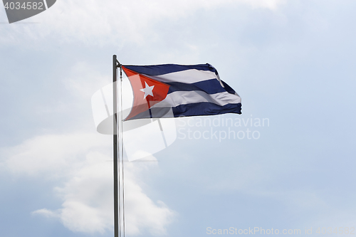 Image of National flag of Cuba on a flagpole