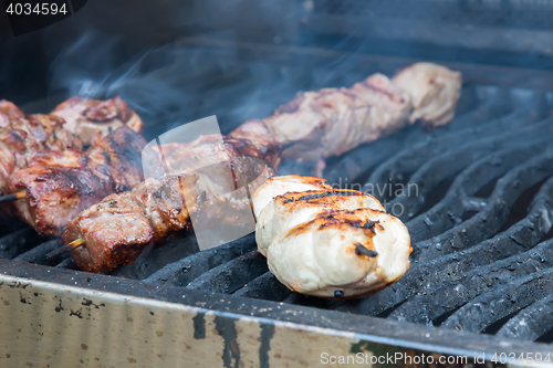 Image of juicy hot shish kebab on the grill