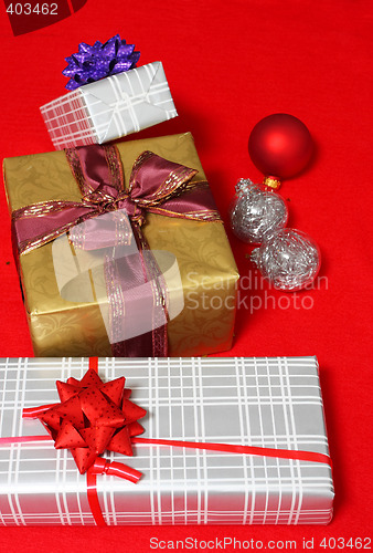 Image of christmas presents on red