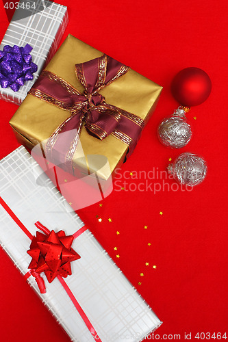 Image of christmas presents on red