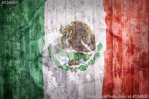 Image of Grunge style of Mexico flag on a brick wall