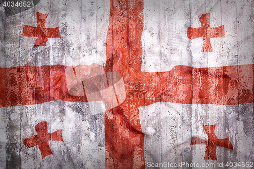 Image of Grunge style of Georgia flag on a brick wall