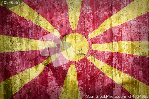 Image of Grunge style of Macedonia flag on a brick wall