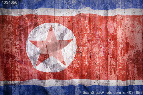 Image of Grunge style of North Korea flag on a brick wall
