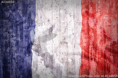 Image of Grunge style of France flag on a brick wall