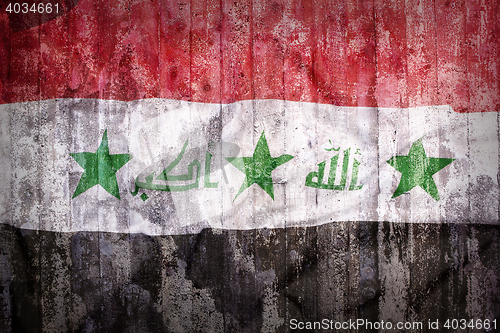 Image of Grunge style of Iraq flag on a brick wall