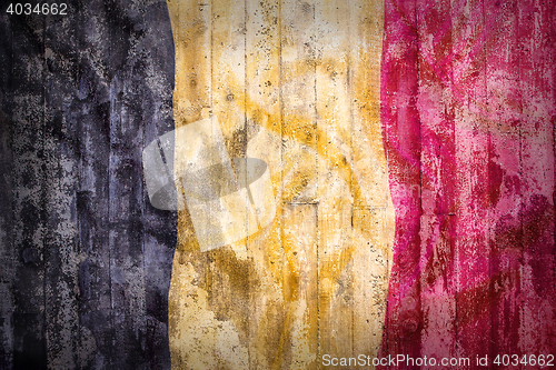 Image of Grunge style of Belgium flag on a brick wall