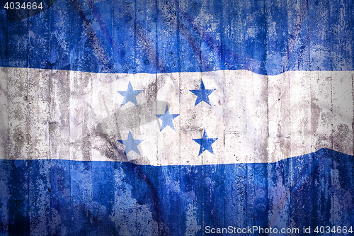 Image of Grunge style of Honduras flag on a brick wall