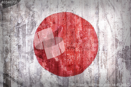 Image of Grunge style of Japan flag on a brick wall