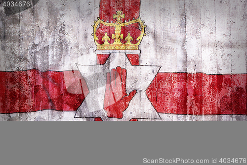 Image of Grunge style of Northern Ireland flag on a brick wall