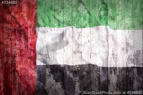 Image of Grunge style of United Arab Emirates flag on a brick wall