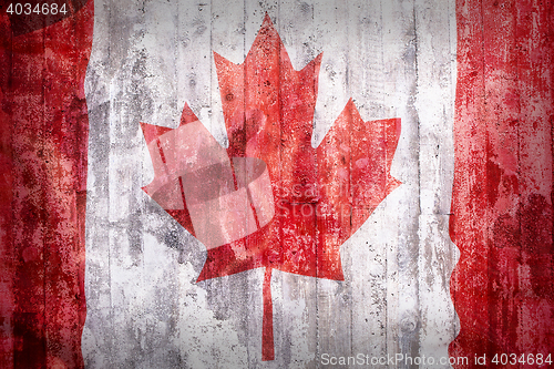 Image of Grunge style of Canada flag on a brick wall