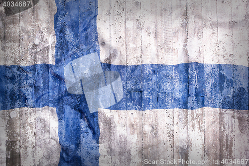 Image of Grunge style of Finland flag on a brick wall
