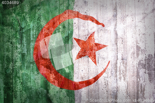 Image of Grunge style of Algeria flag on a brick wall