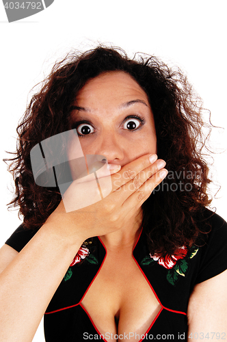 Image of Shocked woman with hand over mouth.