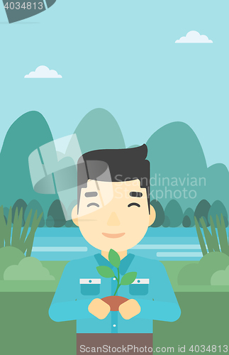 Image of Man holding plant vector illustration.