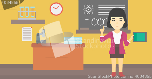 Image of Female student using tablet computer in classroom.