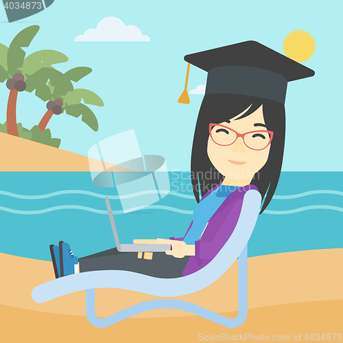 Image of Graduate lying in chaise lounge with laptop.