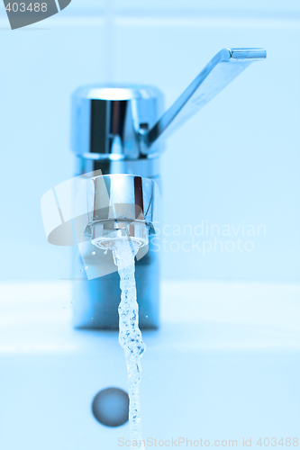 Image of running faucet blue tint