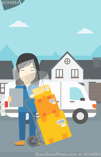 Image of Delivery woman with cardboard boxes.