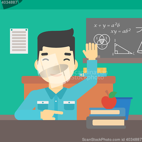 Image of Student raising hand in class for an answer.