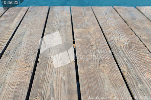 Image of Empty top of wooden background and view to the sea