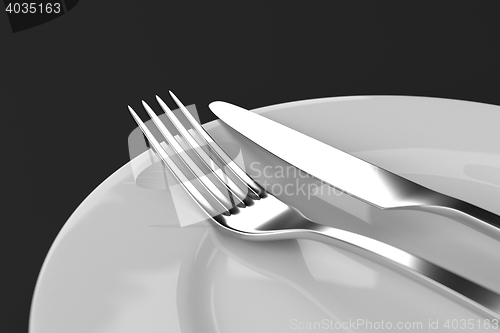 Image of Fork and knife with plates