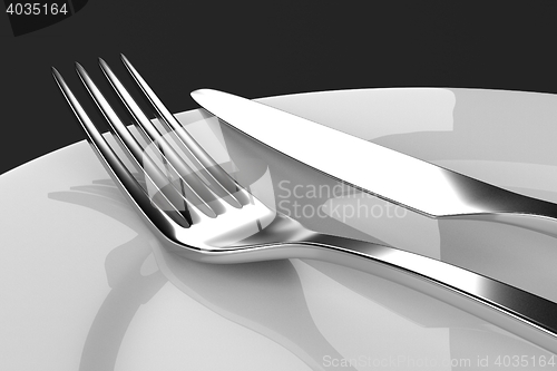 Image of Fork and knife with plates