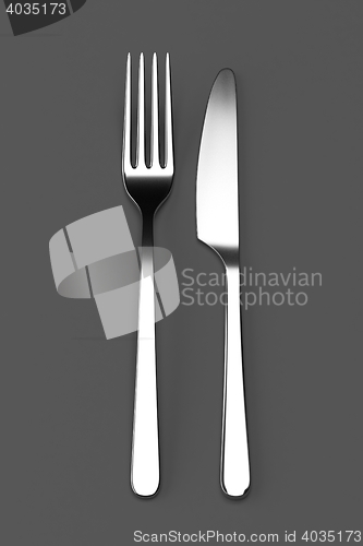 Image of Fork and knife on grey