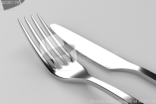 Image of Fork and knife on grey