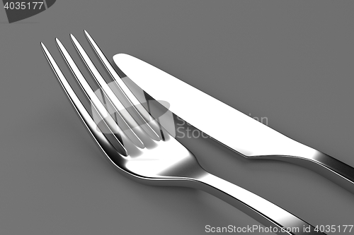 Image of Fork and knife on grey