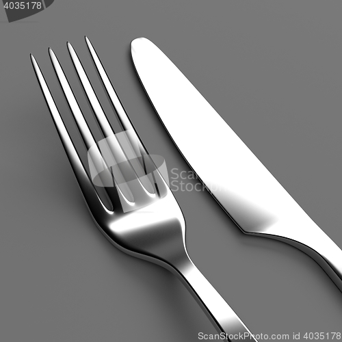 Image of Fork and knife on grey