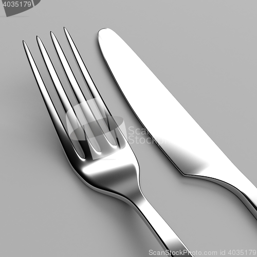 Image of Fork and knife on grey