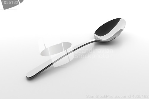 Image of Silver spoon on a table