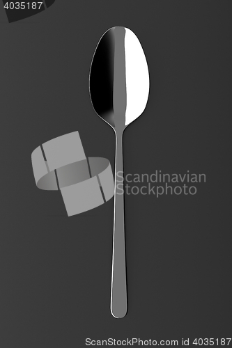 Image of Silver spoon on a table