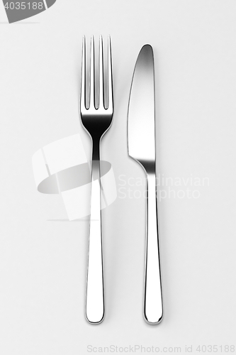 Image of Fork and knife on grey